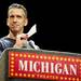 Dan Savages asks the audience not to applaud after answering every question at Michigan Theater on Sunday. Daniel Brenner I AnnArbor.com
